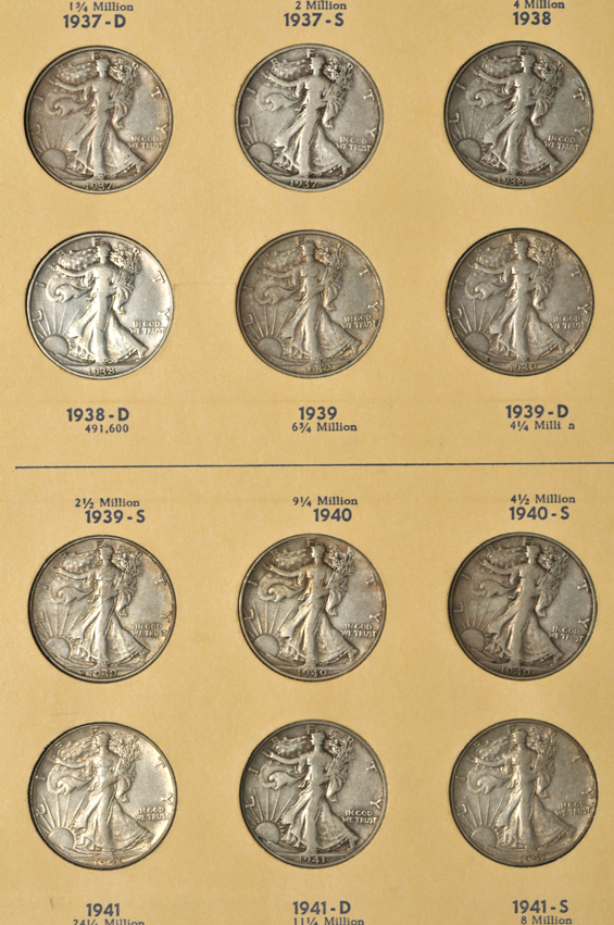 Complete collection of Walking Liberty half-dollars in two Library of Coins albums