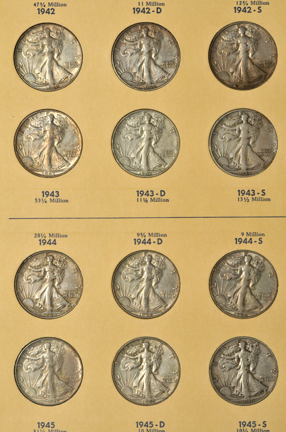Complete collection of Walking Liberty half-dollars in two Library of Coins albums