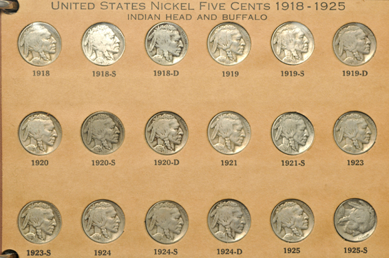 Partial collections of Shield, Liberty, and Buffalo nickels in a Wayte Raymond album