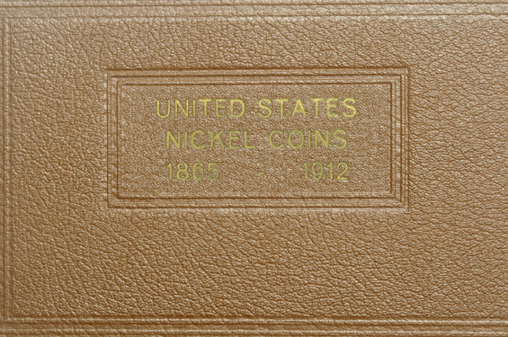 Partial collections of Shield, Liberty, and Buffalo nickels in a Wayte Raymond album