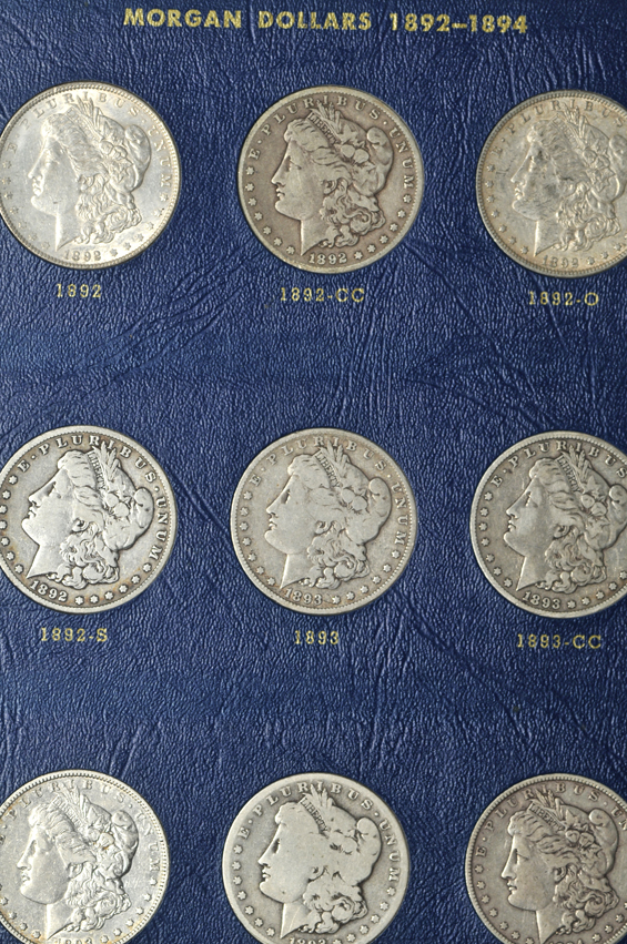 Collection of Morgan silver dollars, 1887 through 1896 (no 1895), in a Whitman 9428 album