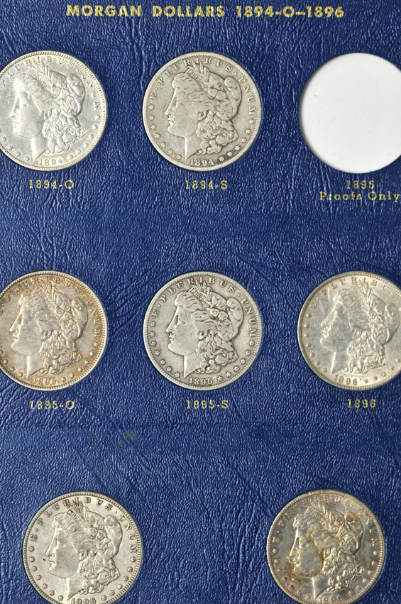 Collection of Morgan silver dollars, 1887 through 1896 (no 1895), in a Whitman 9428 album