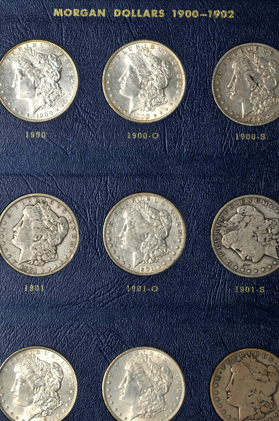 Collection of Morgan silver dollars, 1897 through 1921-S, in a Whitman 9429 album
