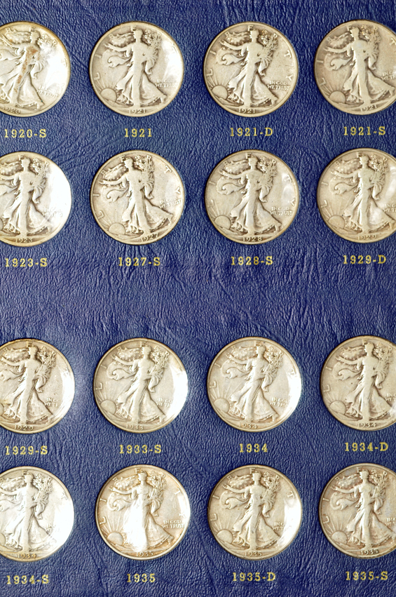 Complete collection of Walking Liberty half-dollars in two Whitman albums