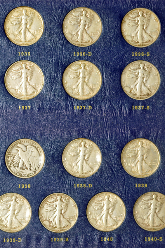 Complete collection of Walking Liberty half-dollars in two Whitman albums