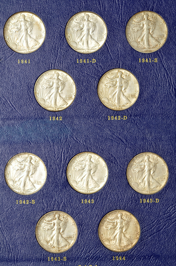 Complete collection of Walking Liberty half-dollars in two Whitman albums