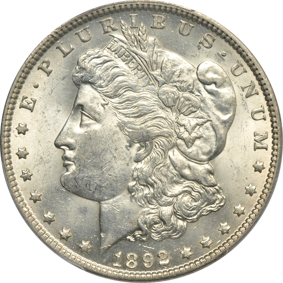 Four Morgan silver dollars in PCGS Genuine holders