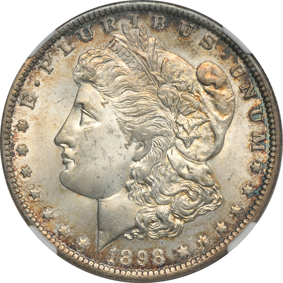 Five toned UNC Morgan dollars, all NGC CAC