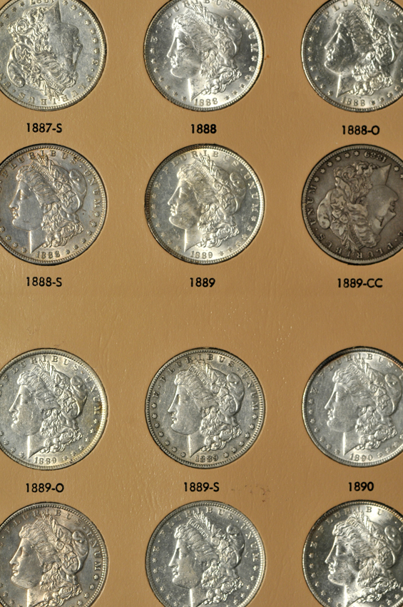 Collection of Morgan silver dollars from1878 through 1890-S in a Dansco 7178 album