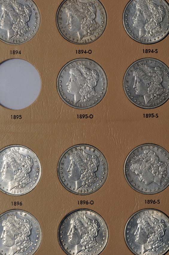 Collection of forty-six different Morgan silver dollars, 1891 to 1921-S, in a Dansco 7179 album