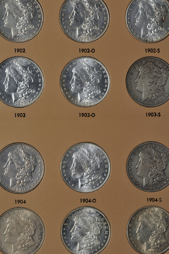 Collection of forty-six different Morgan silver dollars, 1891 to 1921-S, in a Dansco 7179 album