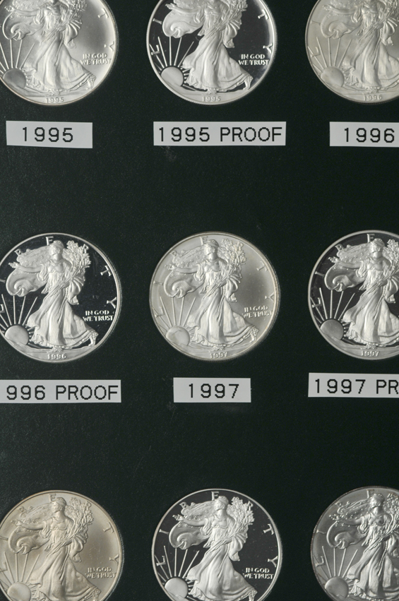 Collection of American Silver Eagles, including proof-only issues, 1986 through 2012-W, in two Intercept Shield albums