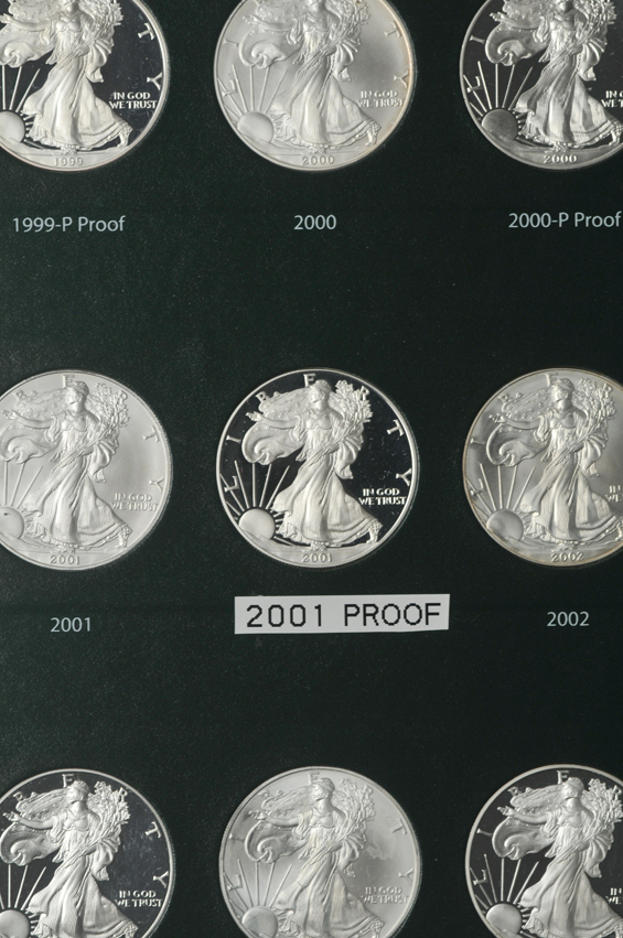 Collection of American Silver Eagles, including proof-only issues, 1986 through 2012-W, in two Intercept Shield albums