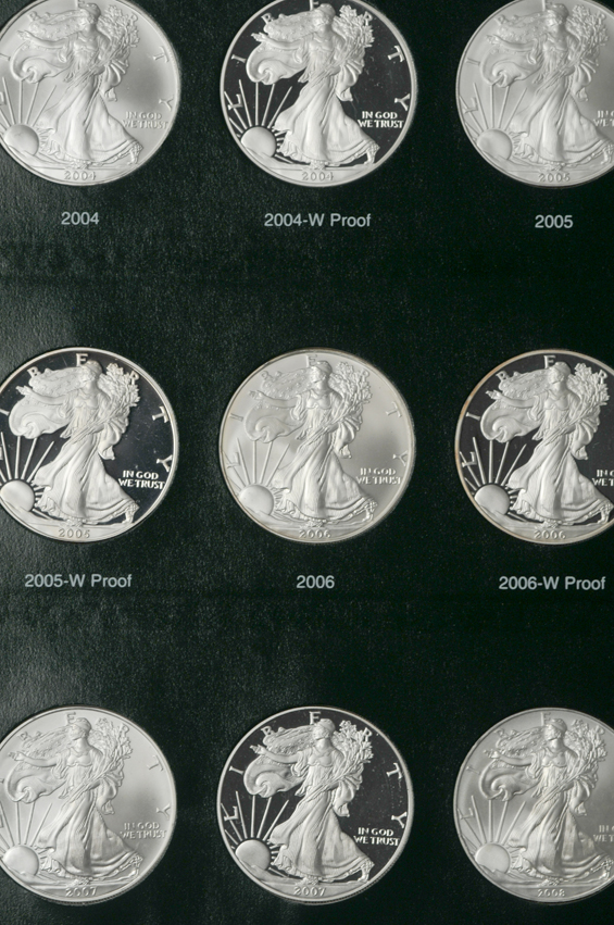 Collection of American Silver Eagles, including proof-only issues, 1986 through 2012-W, in two Intercept Shield albums