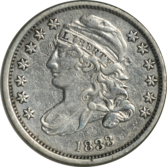 Collection of thirty-six US type coins in a Capital Plastics holder