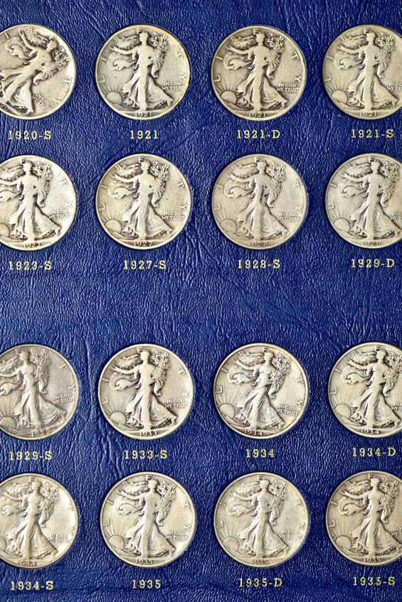 Complete collection of Walking Liberty half-dollars in two Whitman albums