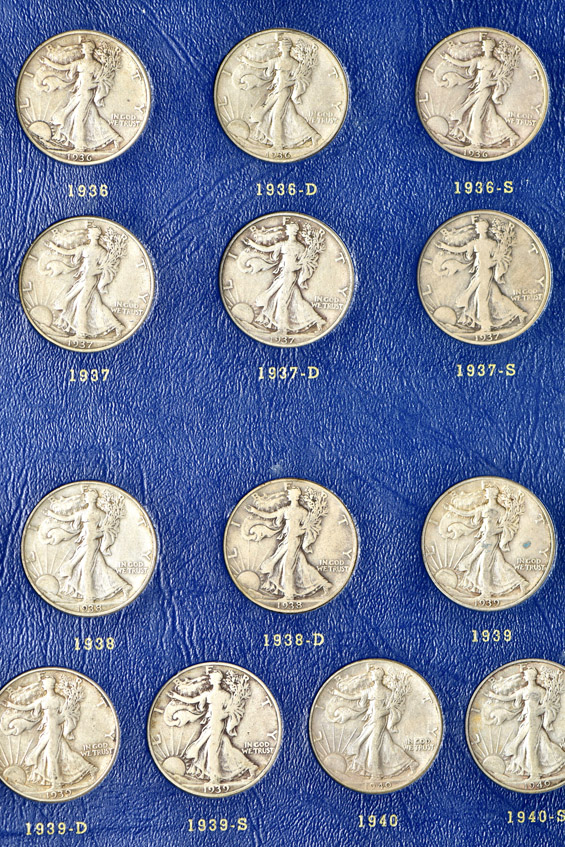 Complete collection of Walking Liberty half-dollars in two Whitman albums