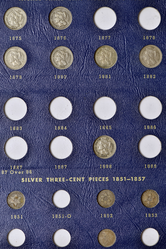 Forty-nine piece collection of two-cent pieces, three-cent pieces, Shield nickels, and twenty-cent pieces in a Whitman 9436 album