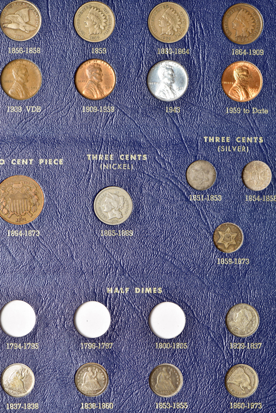 Collection of 144 United States Small Type coins in three Whitman albums