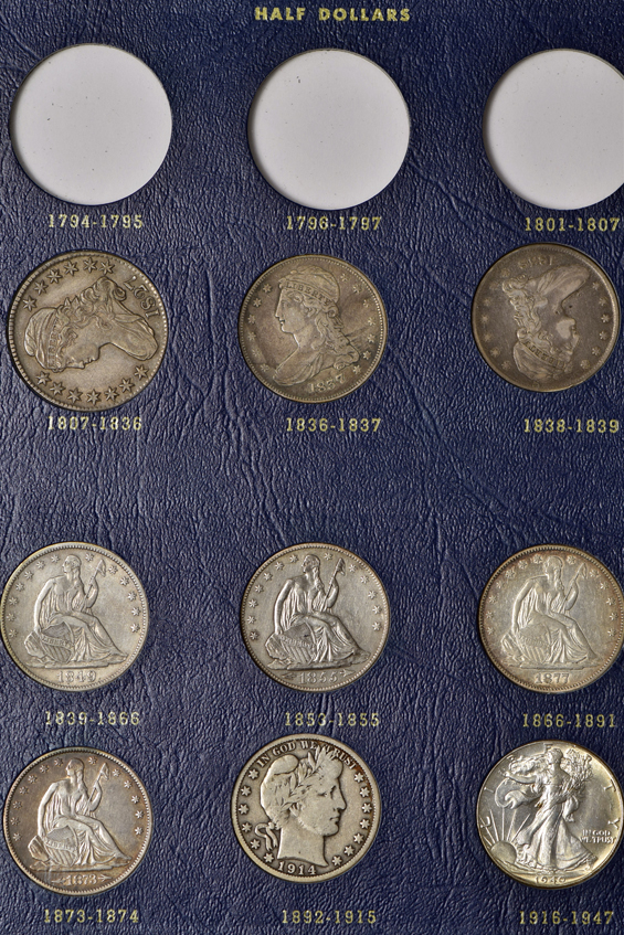 Collection of 57 US Large Type coins in three Whitman albums