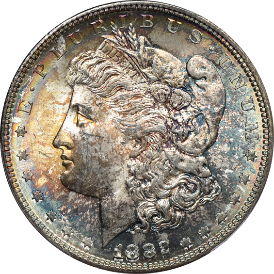 Four colorful Morgan silver dollars certified by PCGS