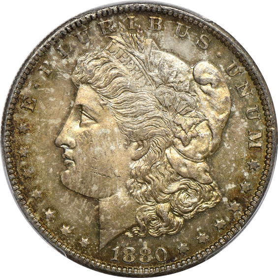 Four colorful Morgan silver dollars certified by PCGS