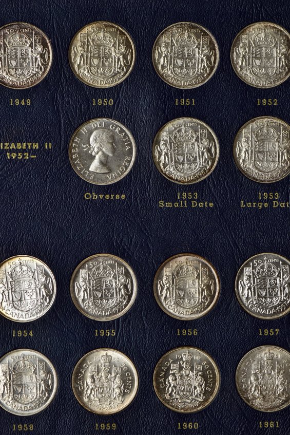Canada - Complete album of fifty-cent pieces from 1937 though 1977 in a Whitman 9509 album.