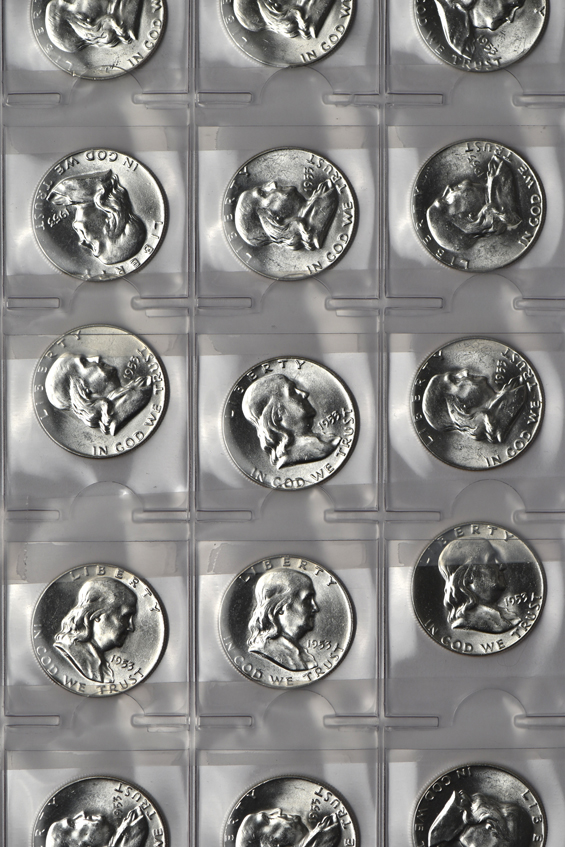Eighty-five BU Franklin half-dollars