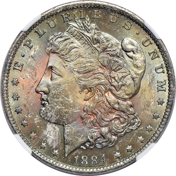 Eleven toned Morgan dollars, plus two toned Peace dollars, all thirteen NGC MS-63