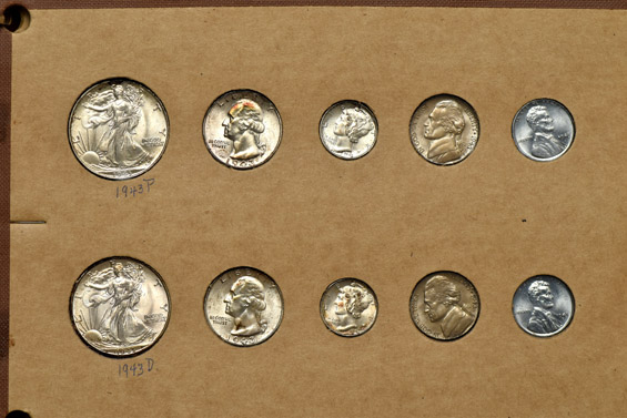 1941 through 1944 Mint State coins in a Wayte Raymond album.