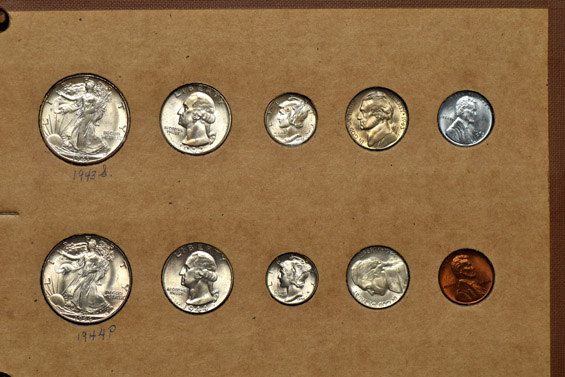1941 through 1944 Mint State coins in a Wayte Raymond album.
