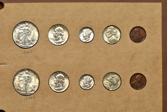 1941 through 1944 Mint State coins in a Wayte Raymond album.