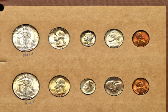 1945 through 1948 Mint State coins in a Wayte Raymond album.