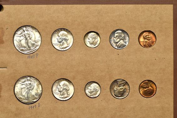 1945 through 1948 Mint State coins in a Wayte Raymond album.