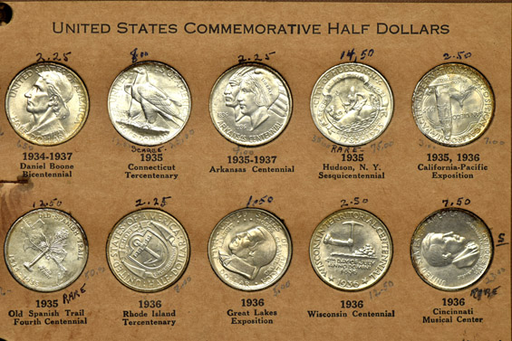 Nearly complete collection of silver commemorative half-dollars in a Wayte Raymond album