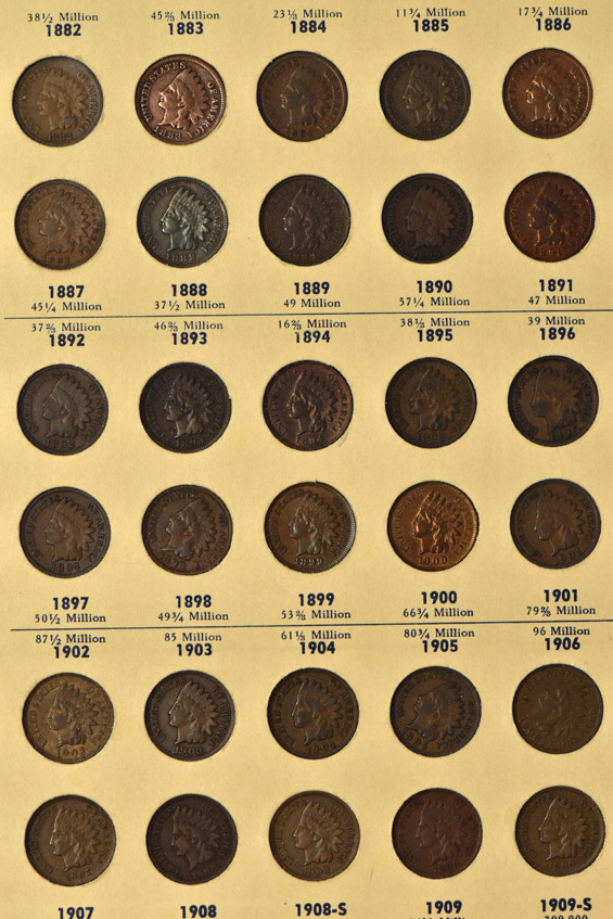 Collection of Flying Eagle and Indian Head cents in a Library of Coins album