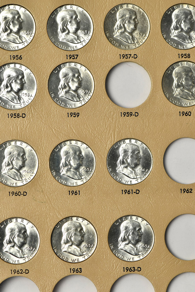 Nearly complete collection of Franklin half-dollars in a Dansco 7165 album