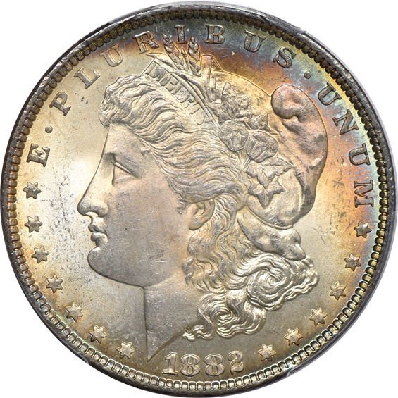 Four richly toned Morgan silver dollars, all certified