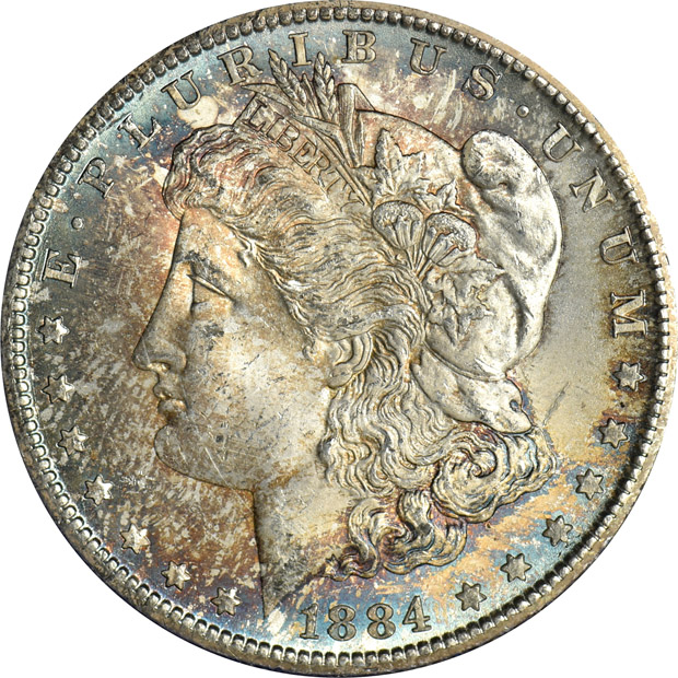Nearly complete collection of ninety-seven Morgan silver dollars in four Capital Plastics holders.