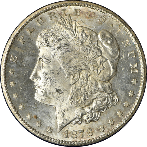 Nearly complete collection of ninety-seven Morgan silver dollars in four Capital Plastics holders.