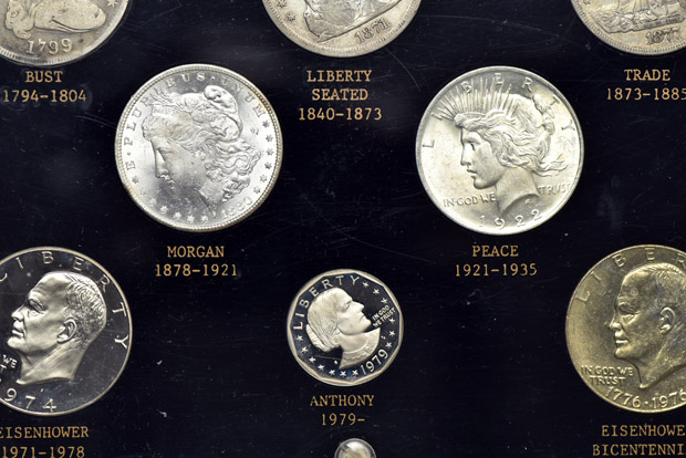 United States half-dollar and dollar type sets in separate Capital Plastics holders