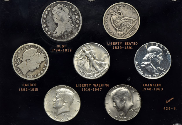 United States half-dollar and dollar type sets in separate Capital Plastics holders