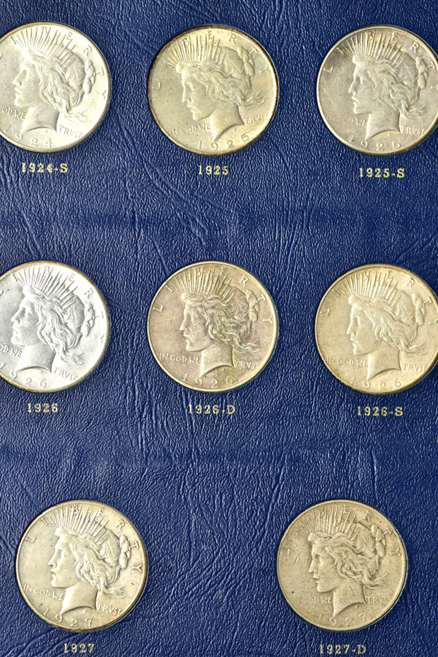 Complete collection of Peace dollars in a Whitman 9430 album