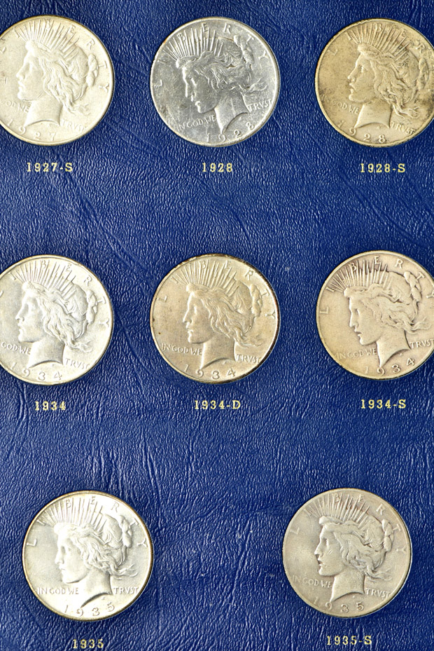 Complete collection of Peace dollars in a Whitman 9430 album