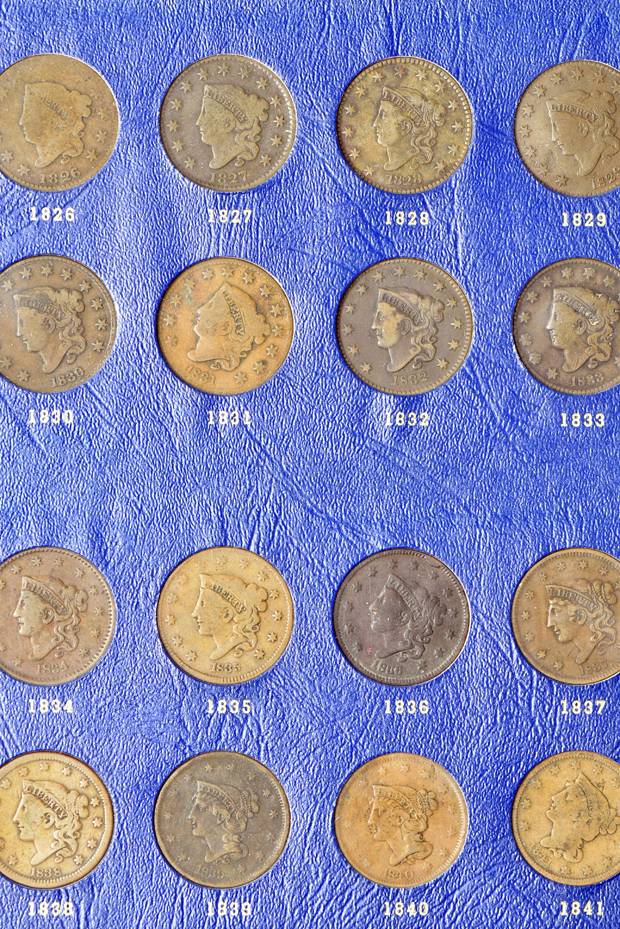 Collection of fifty-five different large cents in a Whitman 9401 album