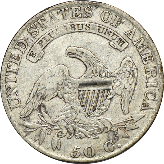 A Flowing Hair half-dollar, plus three Capped Bust half-dollars
