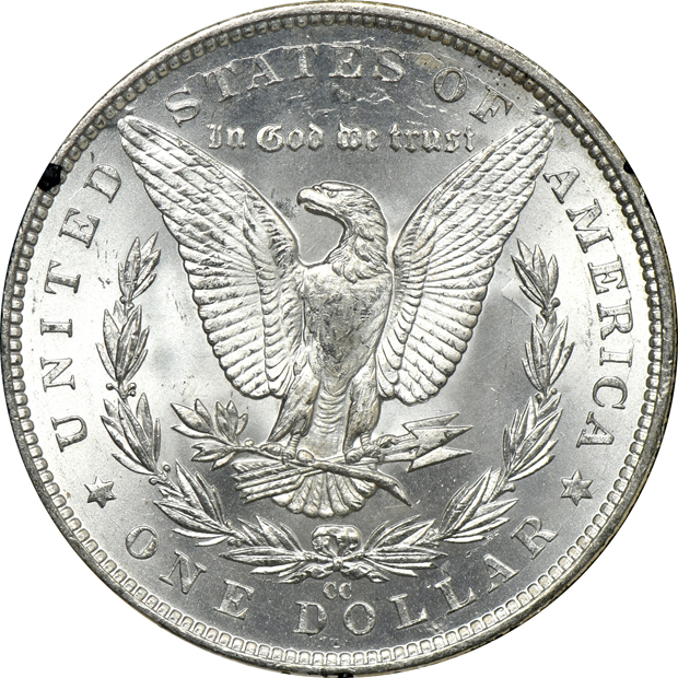 Four Morgan silver dollars including two GSAs