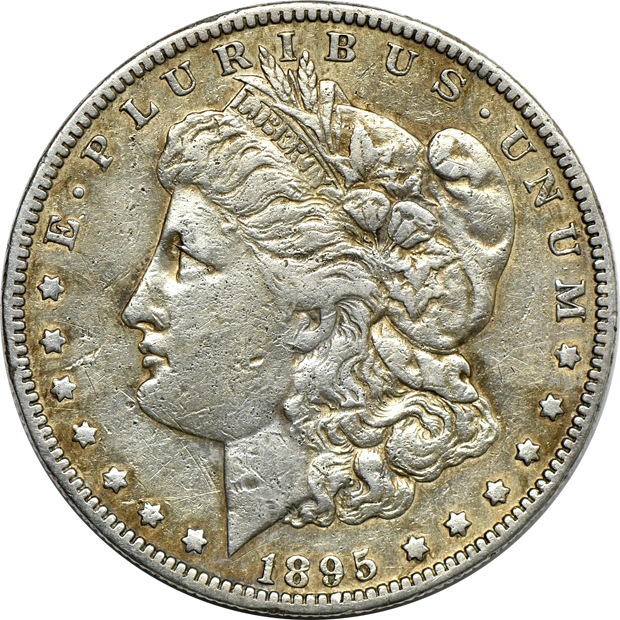 Four Morgan silver dollars including two GSAs