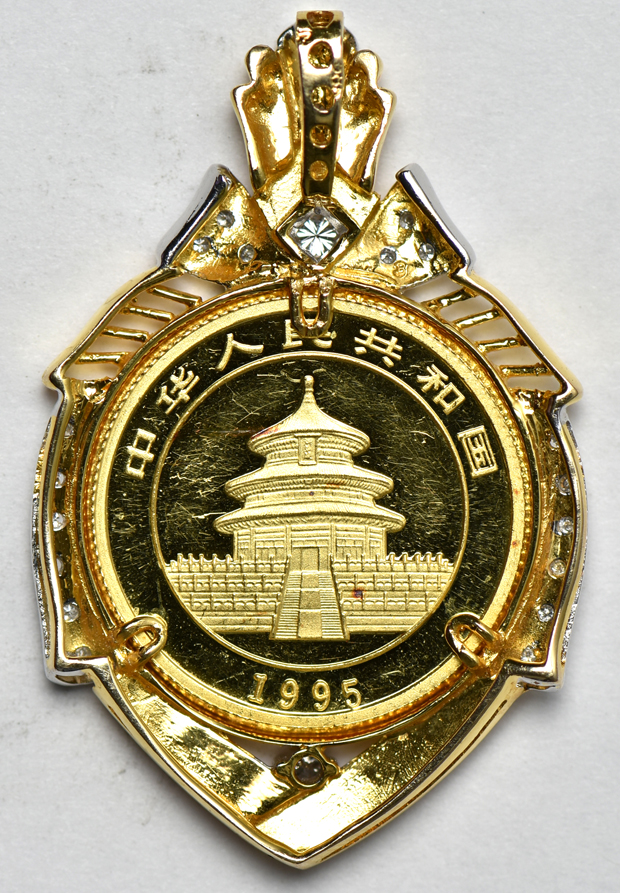 China - 1995 25 yuan 1/4oz gold Panda in a 14k gold bezel, AU details