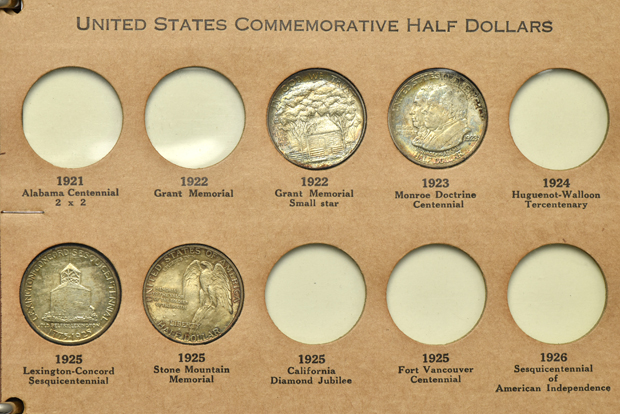 Twelve Silver Commemorative half-dollars in a Wayte Raymond album